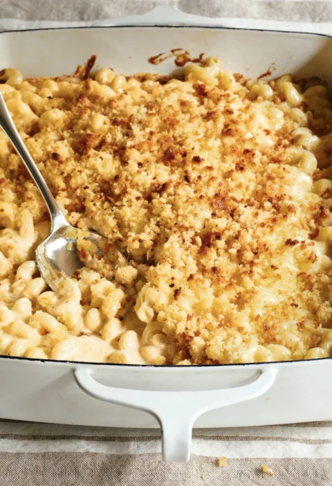 Ina Garten overnight mac and cheese in a baking dish with golden breadcrumb topping and melted Gruyère