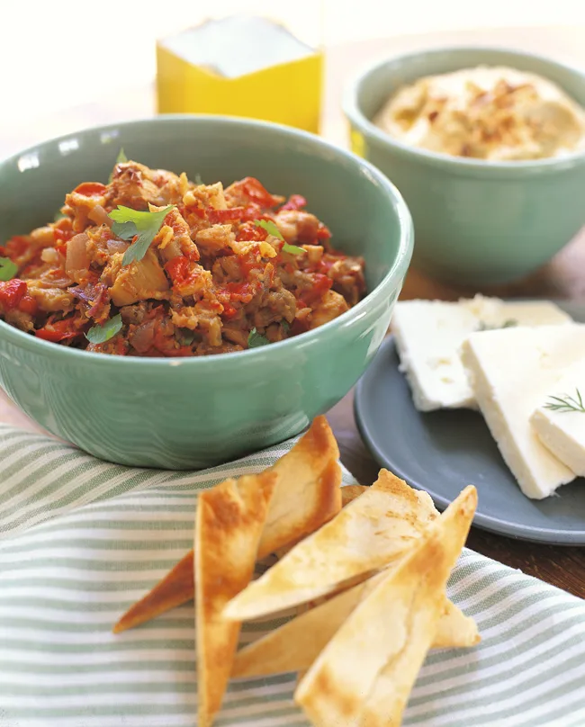 Smoky roasted eggplant spread with red peppers and tomato paste in a serving bowl, an Ina Garten roasted eggplant spread recipe