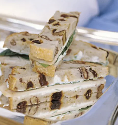 Ina Garten turkey tea sandwiches cut into small triangles on a platter
