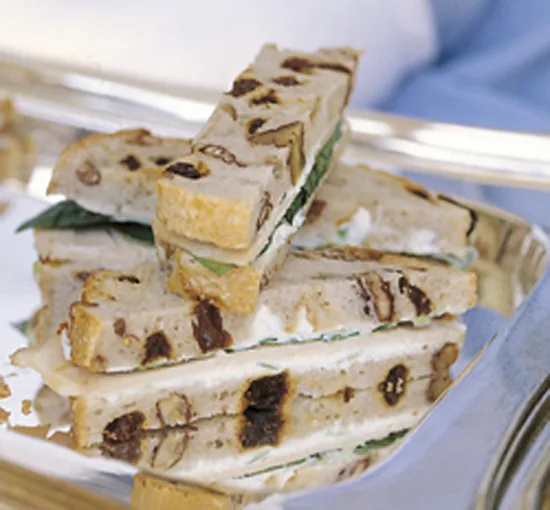 Ina Garten turkey tea sandwiches cut into small triangles on a platter