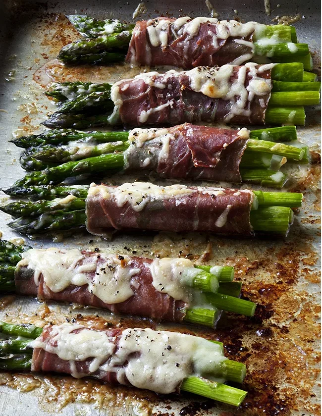Ina Garten asparagus & prosciutto bundles baked with melted Gruyère on a sheet pan
