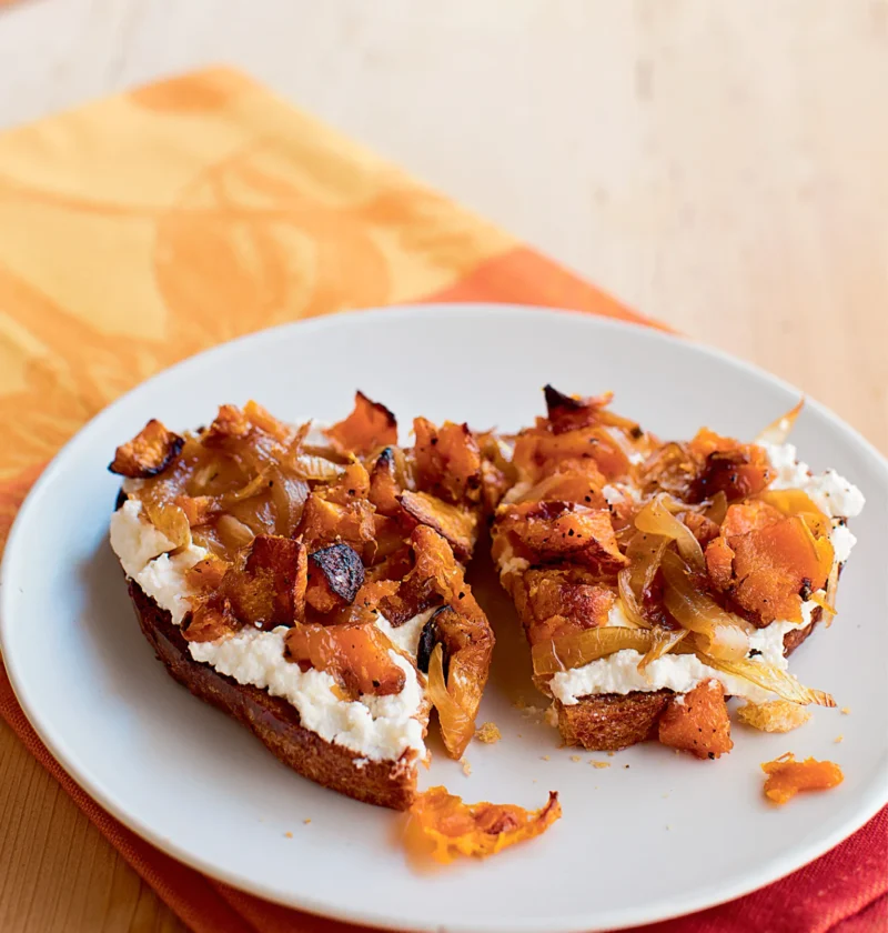 Ina Garten butternut squash and ricotta bruschettas topped with caramelized onions on toasted bread